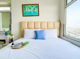 Spacious and Homey 3BR at Green Bay Pluit Apartment By Travelio