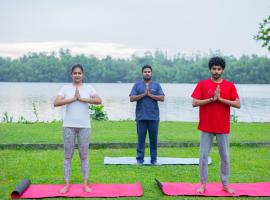 Ayuwaters Authentic Yoga and Full Board Ayurveda Retreat by the Bentota River, hotel in Bentota