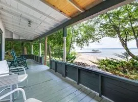 Torch Lake Getaway with Private Beach and Boat Dock!