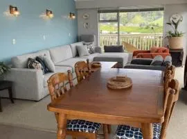 Relax and rewind at Waihi Beach with Oberon Bach