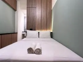Warm and Homey 2BR at Vida View Makassar Apartment By Travelio