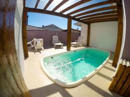 Residencial da Bia - Casas com 2 Dorms na Praia da Cal com Piscina Térmica, hotel v destinaci Torres