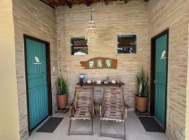 Suítes Curió - Passarim Hospedagem, hôtel à Cumuruxatiba