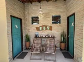 Suítes Curió - Passarim Hospedagem