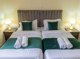 Riverside Haven 4BR Modern Home with Private Serene Compound