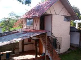 Botón de oro hostal