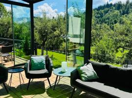 Cazare Colibița Casa Lipan cu jacuzzi, foișor și loc de joacă, alojamento na praia em Colibiţa