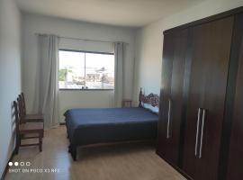 Excelente suíte próximo ao centro, hotel in Itaperuna