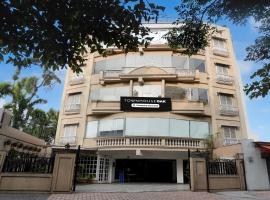 Super Townhouse Oak Rajpur Road Dehradun, hotel in Dehradun