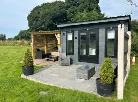 Dolafon farm luxury glamping cabin with hot tub