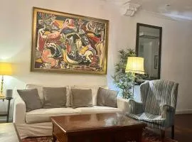 Small stylish room with comfortable queen-size bed in very large, beautifully decorated shared flat in the historic centre of Malaga