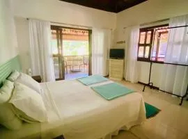 Flat Oxóssi, condomínio beira-mar, varandão e piscina