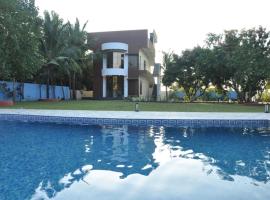 ecr resorts- pleasant stay farmhouse, מלון בSadras