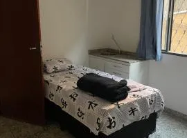 Suíte privada com cozinha e sala