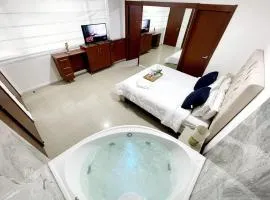 Ecusuites Jacuzzi Executive Dpto Riverfront l puerto santa ana