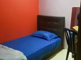 Cozy single bedroom with shared bathroom