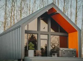 Sniegi design cabin with included sauna and jacuzzi