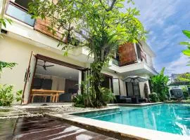 Villa Tepi Sungai a luxurious, under new management, 6 bedroom 620 sqm retreat featuring a stunning 15 meter pool and dedicated childrens room with 4 bunk beds newly renovated in Seminyak