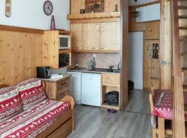 Appartement charmant à Les Menuires, 36 m², vue montagne.