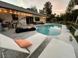 Vacation pool home in the woods.