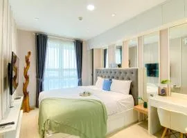 Fancy and Nice 1BR at Citralake Suites Apartment By Travelio