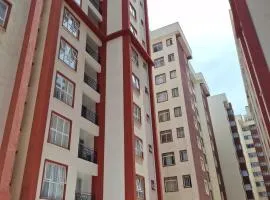 Secret Serenity - Modern, Stylish & Comfy 2 Bedroom Apartment With Workspace, Secure Parking, CCTV, Swimming Pool, Gym, And City Views in Nairobi