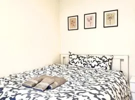 Cozy Room with Private Balcony in Prime location