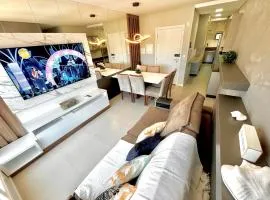 Apartamento perto do mar com piscina e rede de proteção