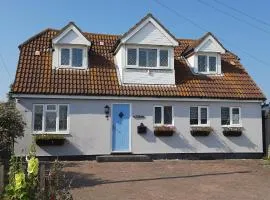 3-Bedroom Family Home. Just 5 Mins From The Beach!