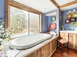 Luxurious sky loft with giant soaker tub, steam room, views