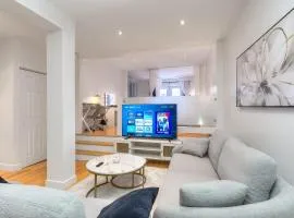 Take a break in a modern loft on the plateau Walk score 99