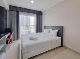 Homey and Scenic Studio at Patraland Amarta Apartment By Travelio