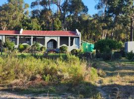 Tesselaarsdal Backpackers & Koshuis, хотел в Каледон