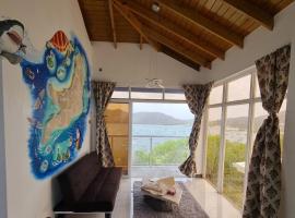 GARNET--A gem at DEE'S PEARL, majake sihtkohas Carriacou