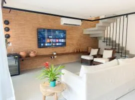 Casa Piscina Privativa a passos do mar