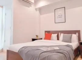 Comfy and Minimalist 1BR Branz BSD City Apartment By Travelio