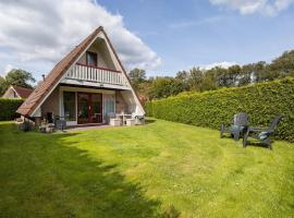 Boomklever I Charmante Vakantiewoning met Openhaard, hotel con pileta en Zwiggelte