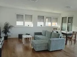 Neubau Appartement mit Terasse, privater Eingang,Parkplatz,Küche