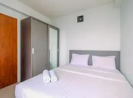 Combined 2BR with Study Room Titanium Square Apartment By Travelio