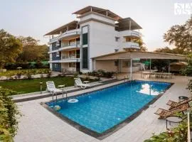 Grey Hues with Swimming Pool & Lawn at Karjat by StayVista
