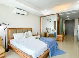 Big and Comfy Studio at Kemang Village Apartment By Travelio