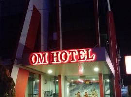 Om Hotel, hotel v destinaci Simpang Ampat