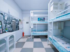 Flying Model Room International Youth Hostel, hostel v destinaci Charbin