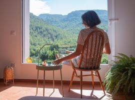 L'Alm&agrave;ssera - Chimenea y monta&ntilde;a para grupos en Aielo de Rugat, chal&eacute; alpino em Ayelo de Rugat