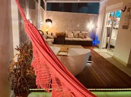 Apartamento Exclusivo a 600m da Praia de Palmas Piscina Banheira de Imersão aquecida rede