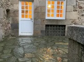 Appart COQUET Intra-Muros façade historique rez de chaussée terrasse