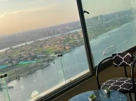 شقة على النيل مباشر بالمعادى 3 غرف الدور 31 فيو الاهرامات