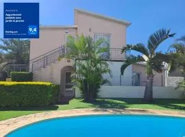 Appartement paisible avec jardin & piscine