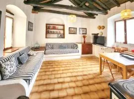 Maison confortable à Rogliano avec terrasse et jardin