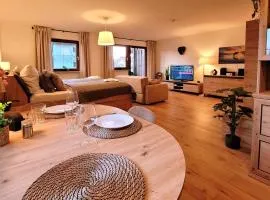 MADISON Homes Apartment 50 qm in Prien mit Balkon, Bergblick, Parkplatz, zentral gelegen